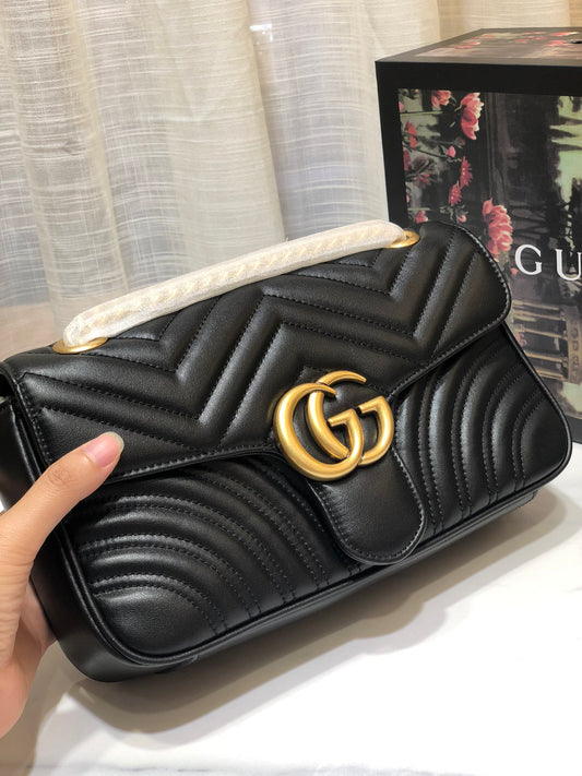 Marmont Gucci laukku