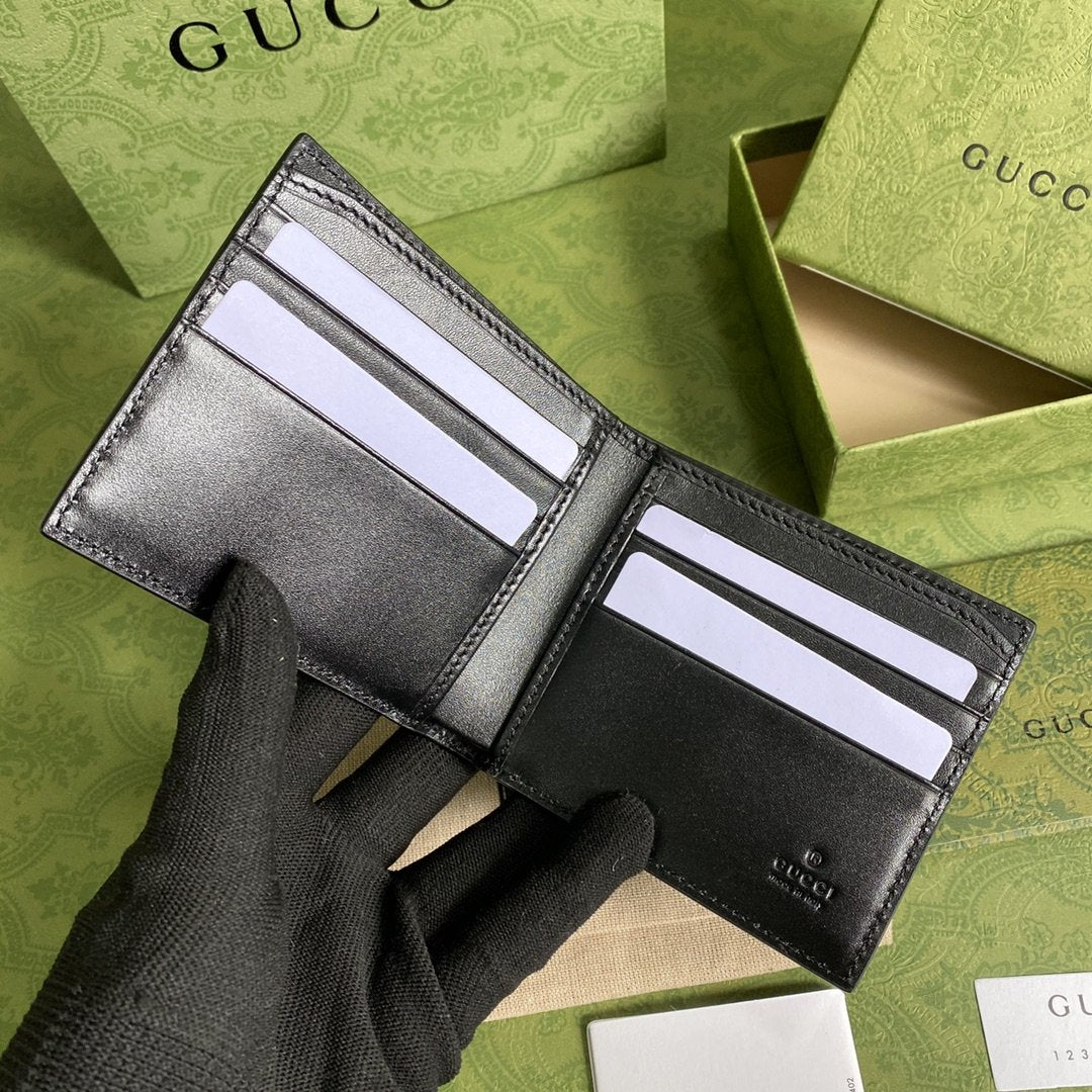 GUCCI kohokuvioitu GG-kuvioinen lompakko