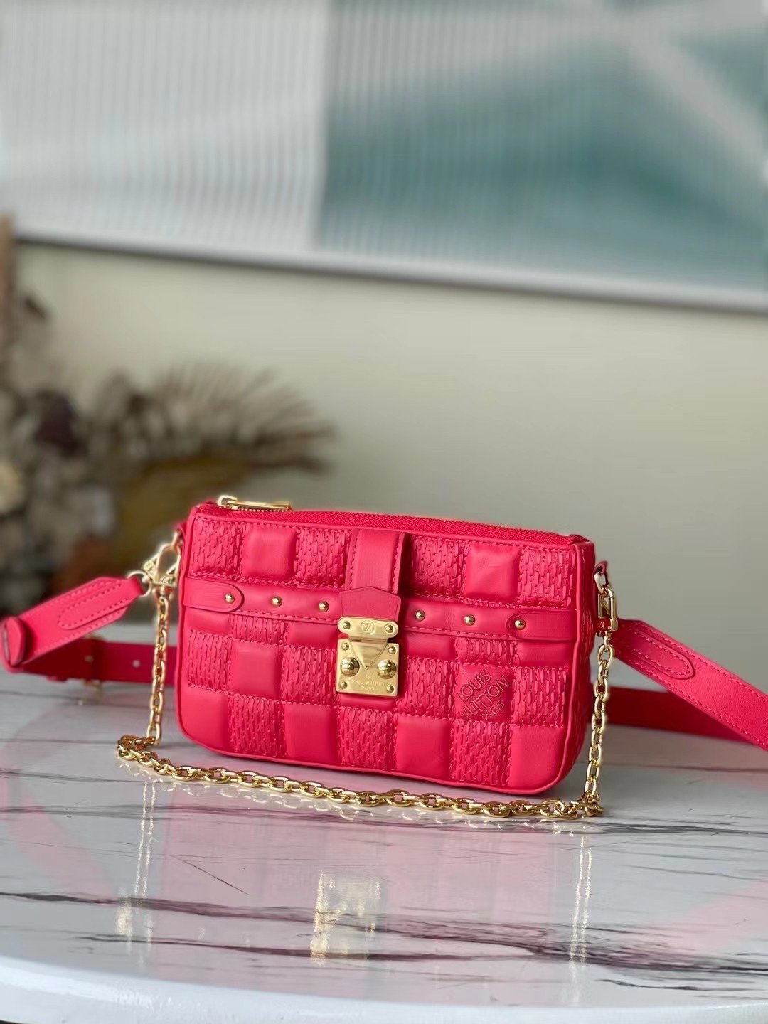 BOLSO POCHETTE TROCA LOUIS VUITTON