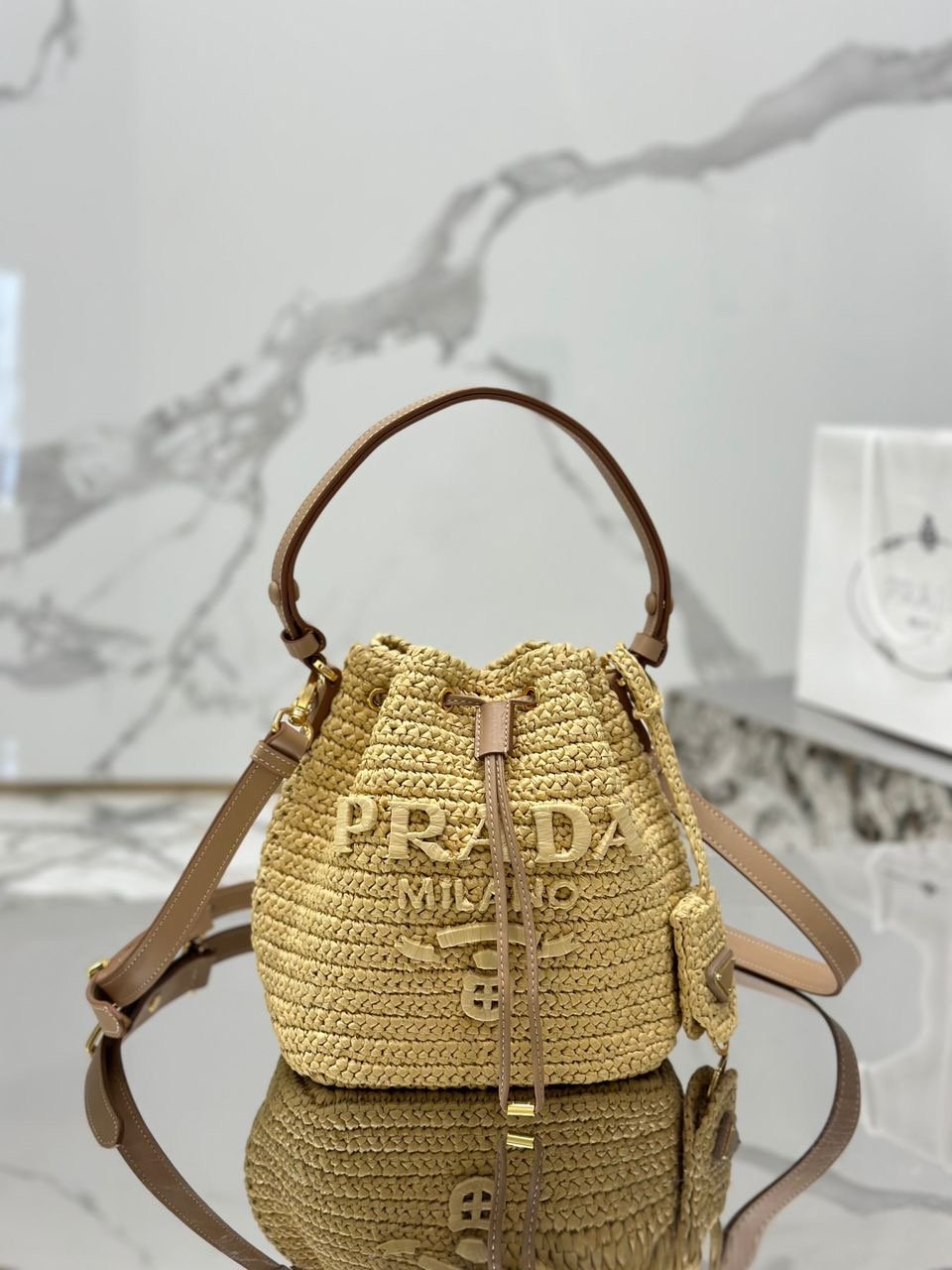 Minibolso saco de croché y piel PRADA