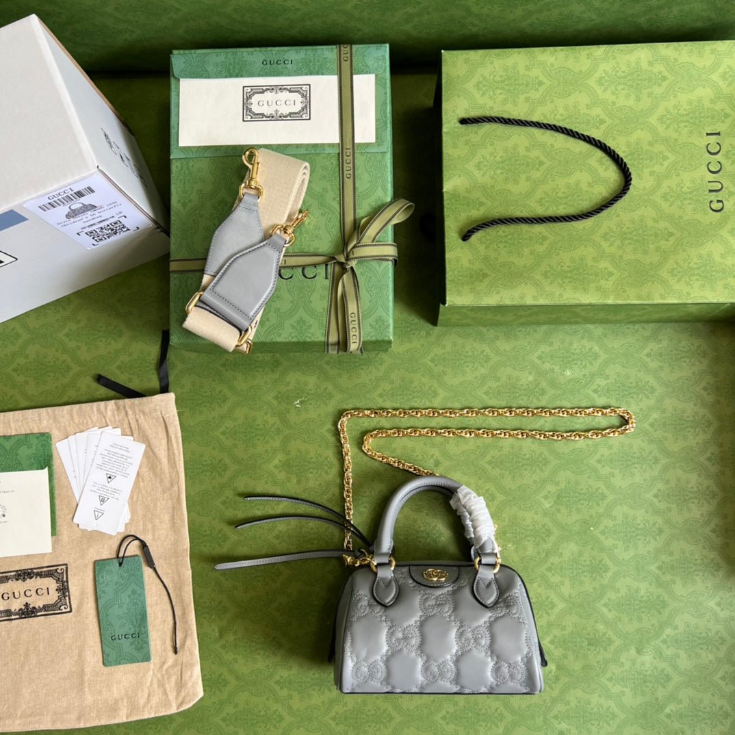 Bolso de mano en piel matelassé con GG Gucci