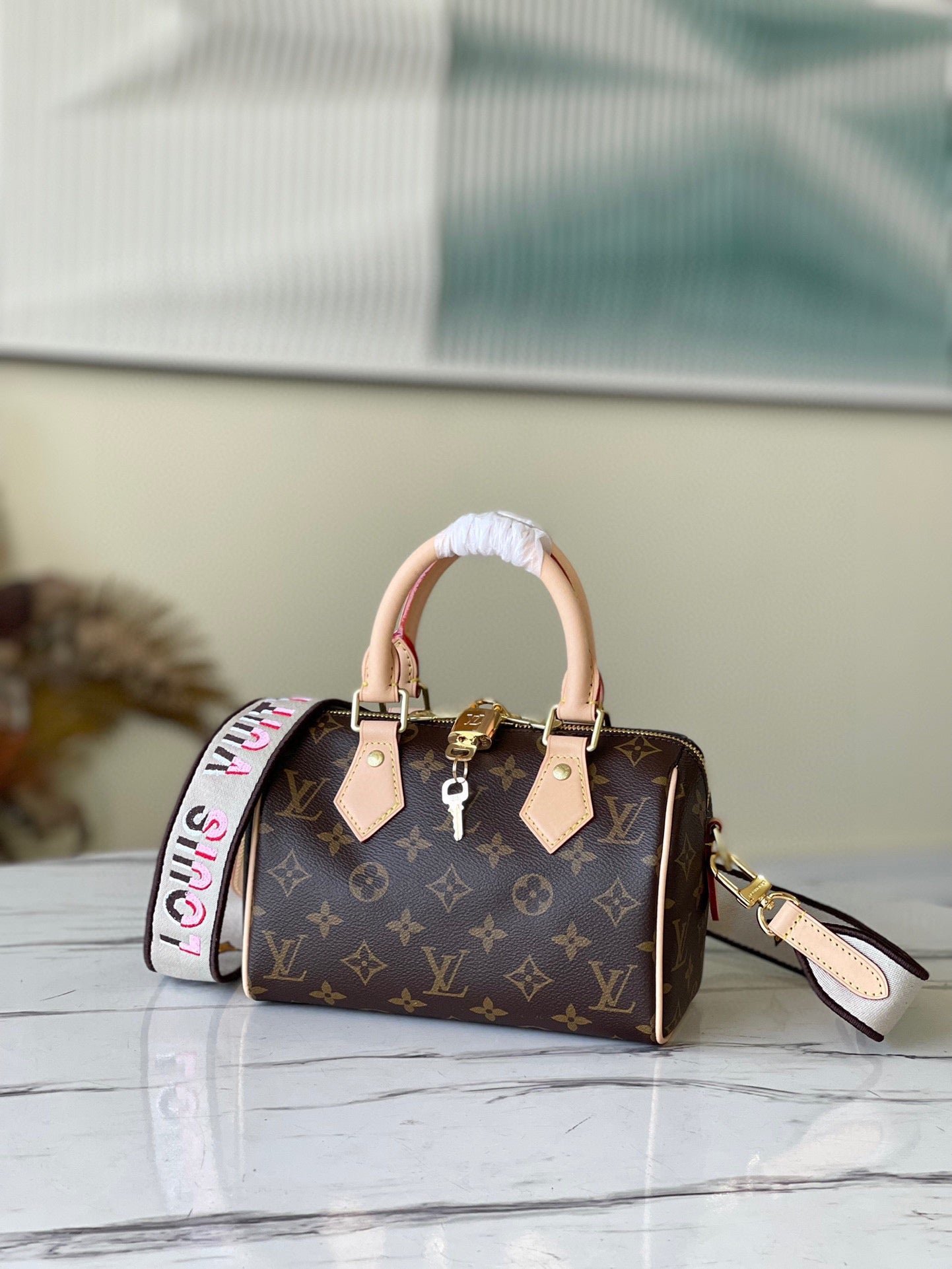 BOLSO SPEEDY 20 CON BANDOLERA LOUIS VUITTON