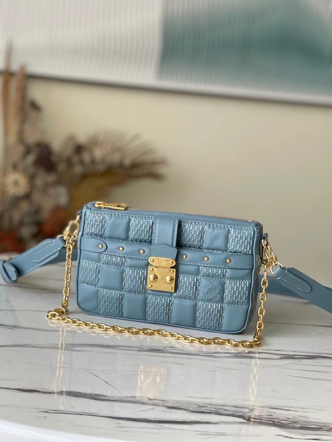 BOLSO POCHETTE TROCA LOUIS VUITTON