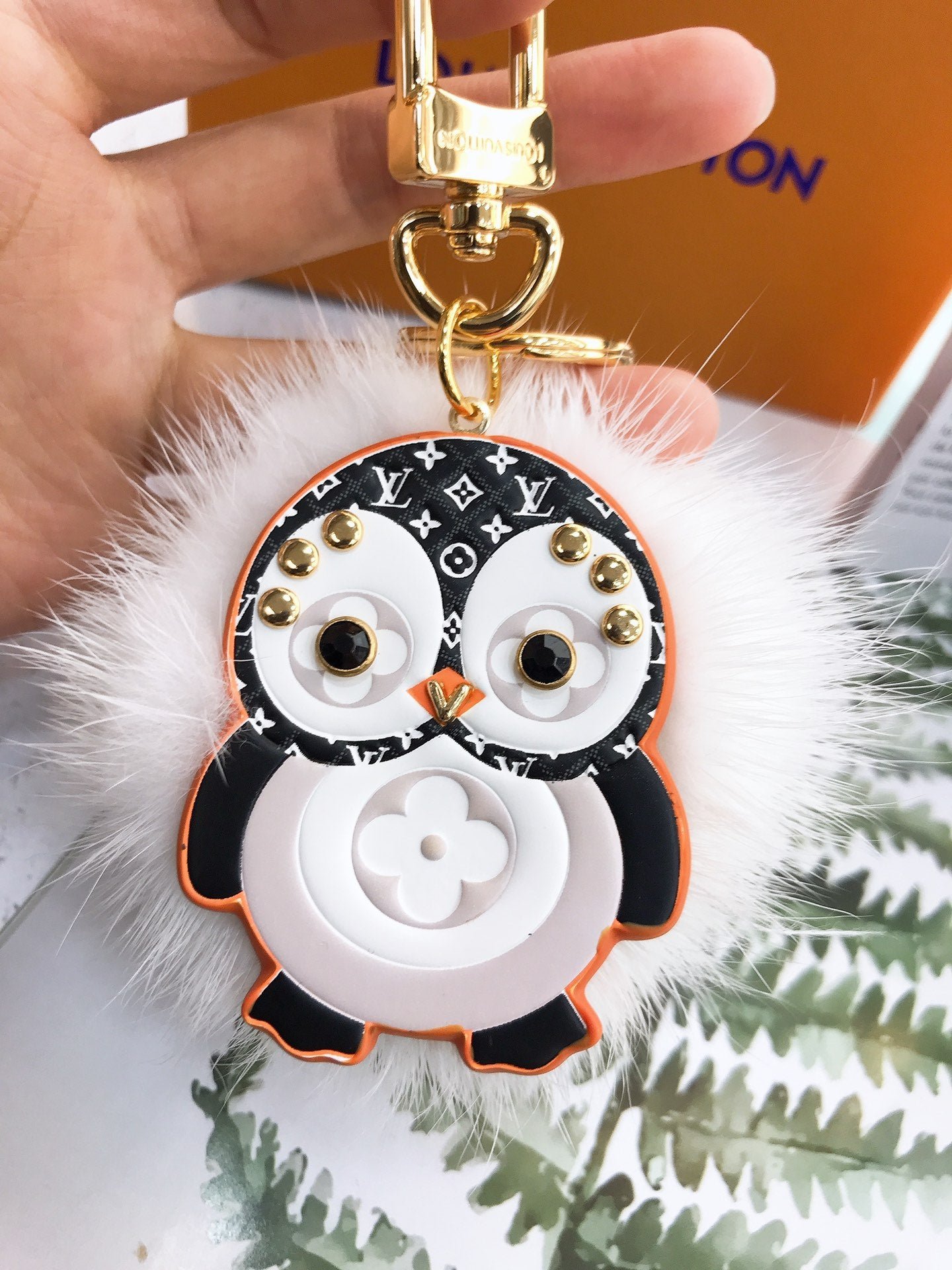 Colgante y llavero penguin Louis Vuitton