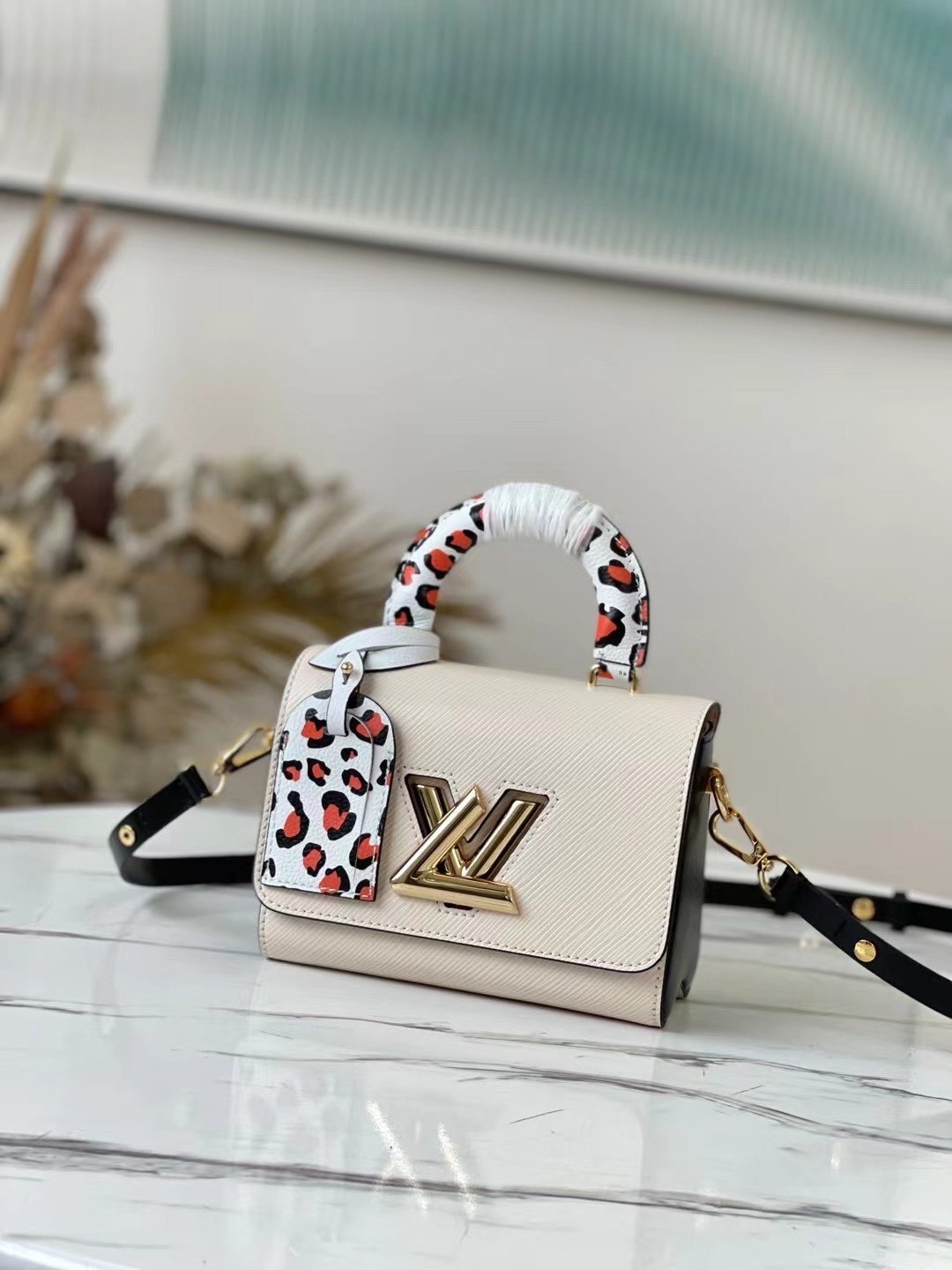 BOLSO TWIST PM Louis Vuitton