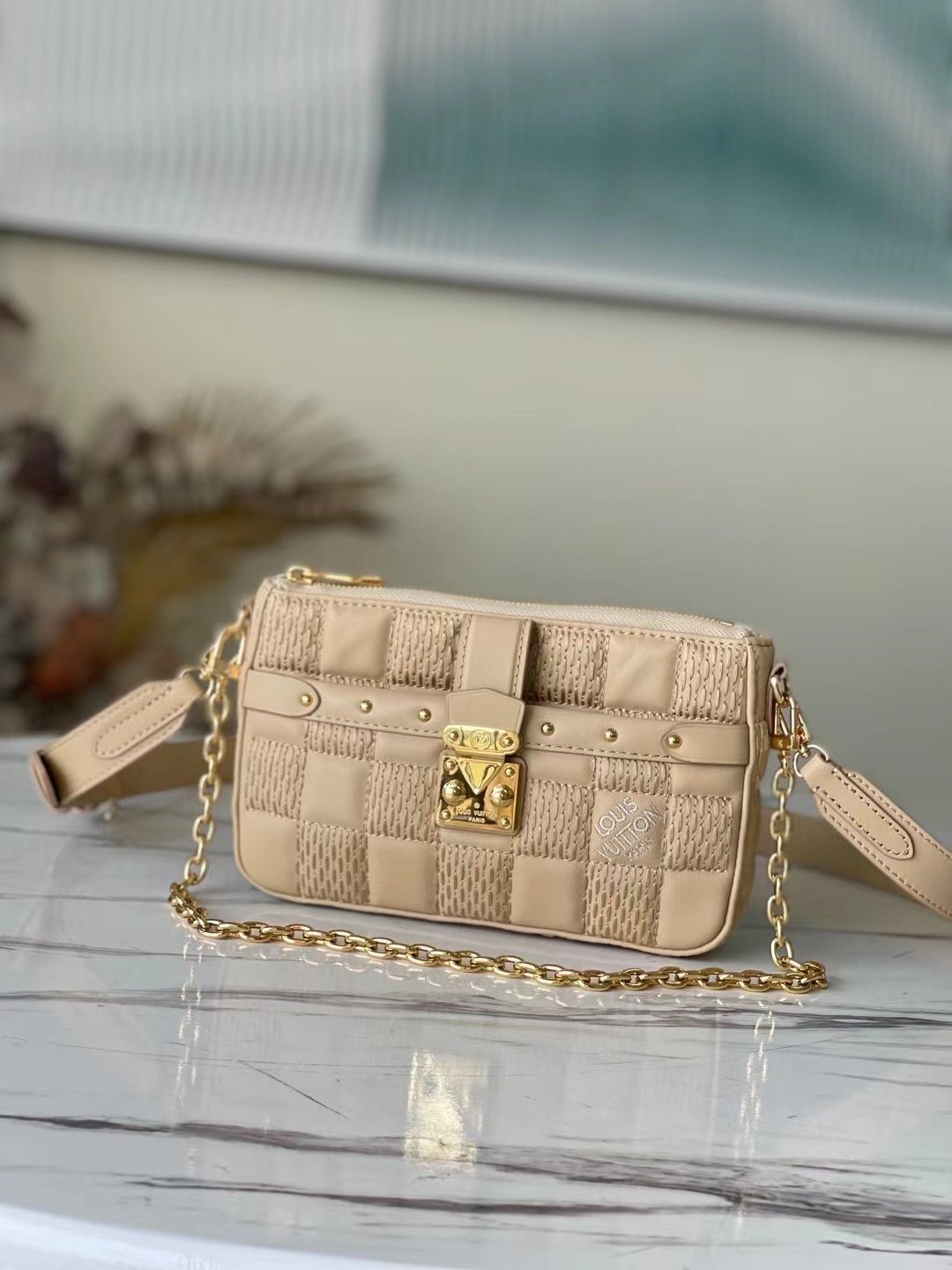 BOLSO POCHETTE TROCA LOUIS VUITTON
