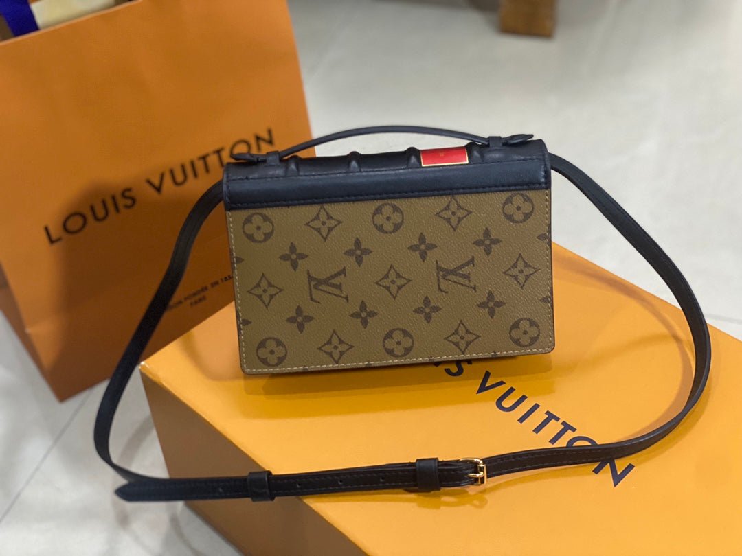 Cartera LV Book con cadena LOUIS VUITTON