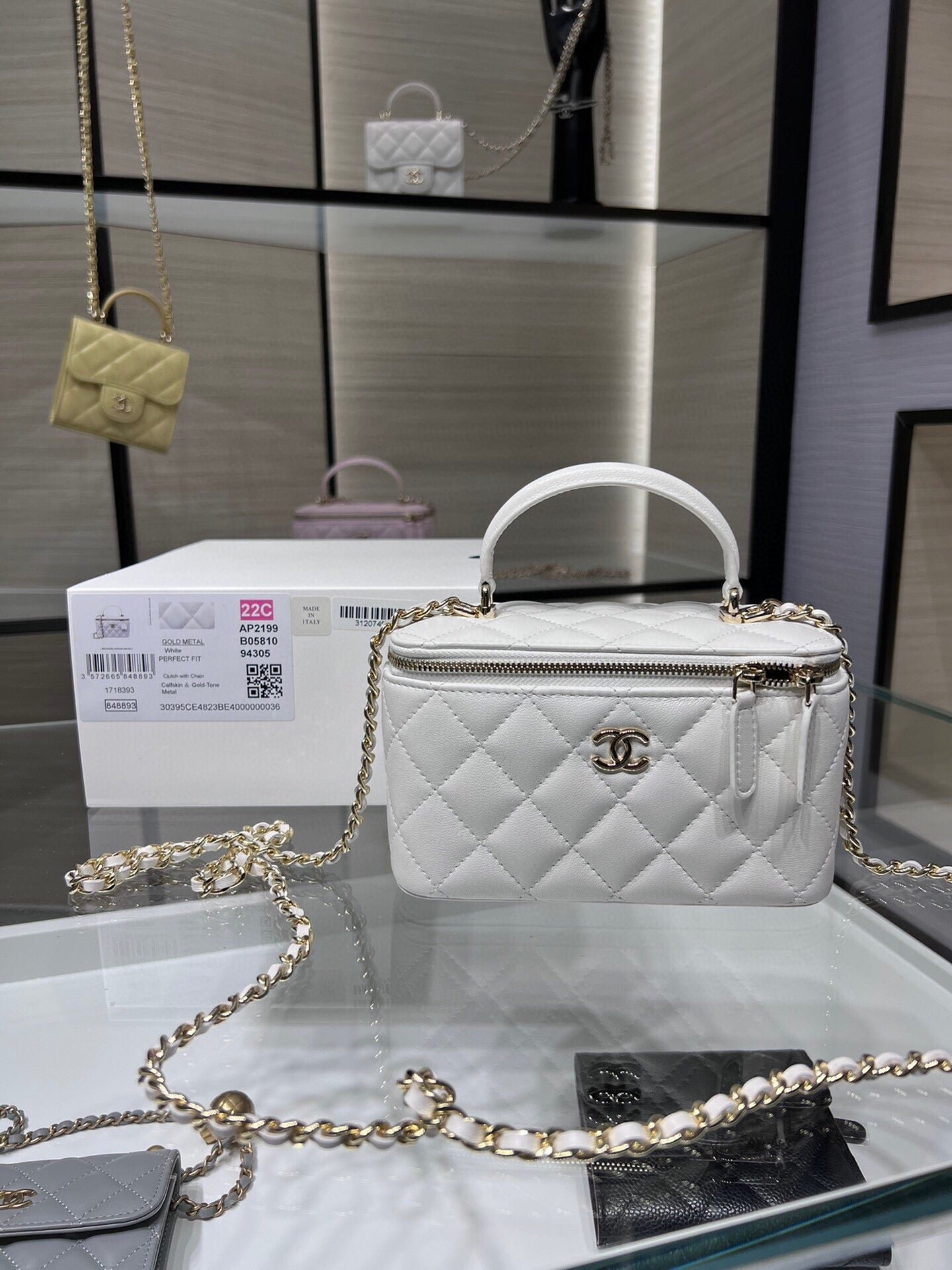 VANITY CASE CON CADENA CHANEL