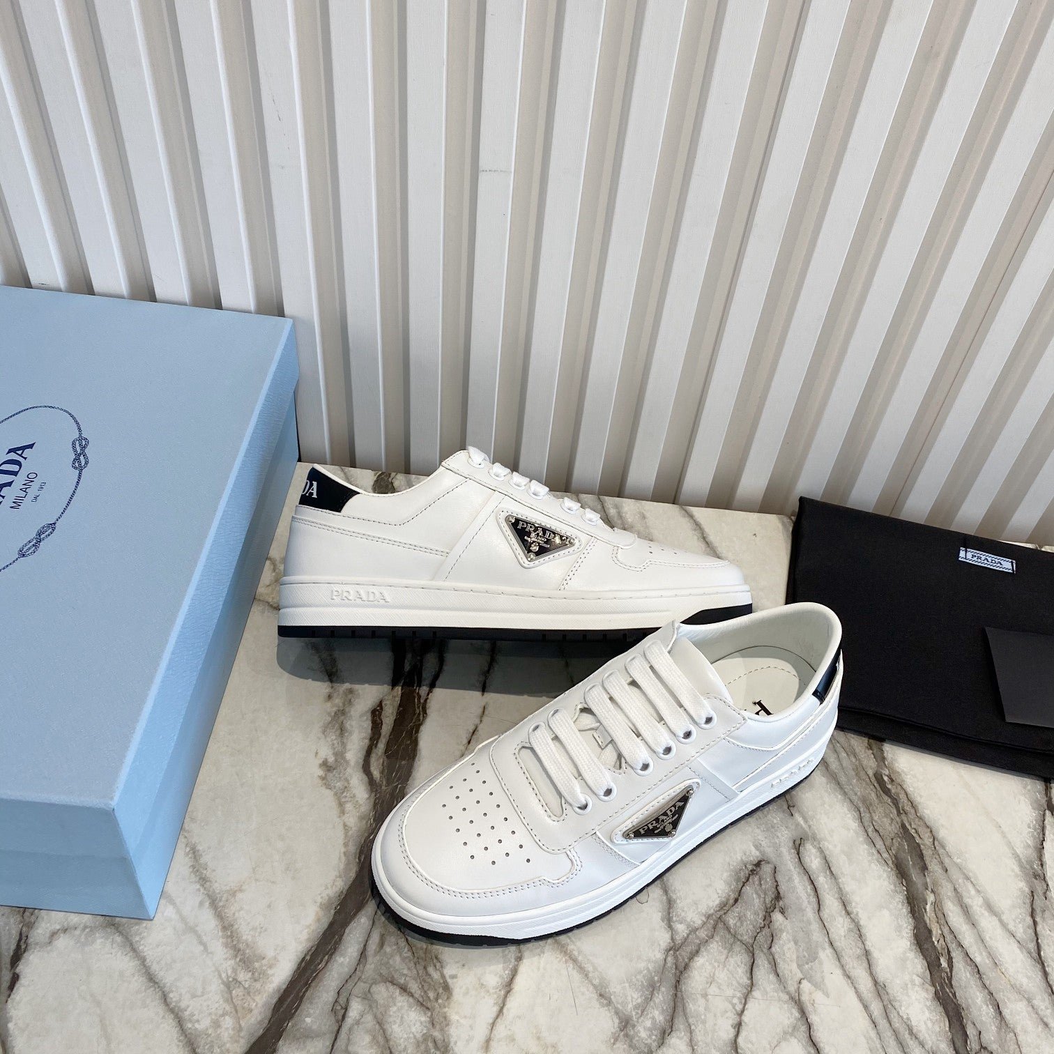 Zapatillas Downtown de piel perforada PRADA