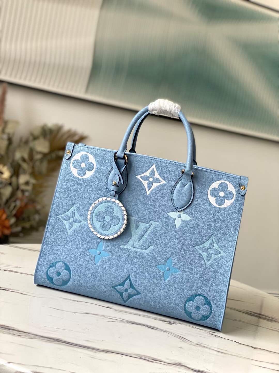 BOLSO ONTHEGO MM Louis Vuitton