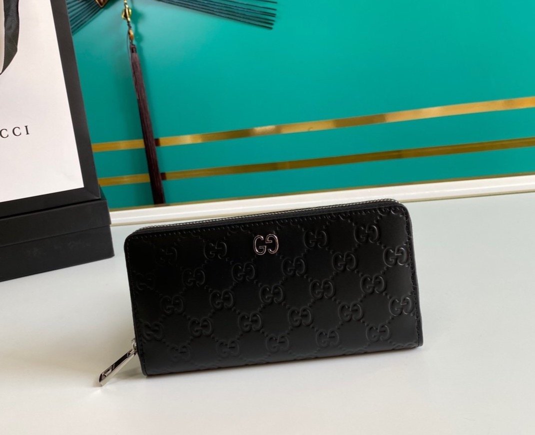 Cartera con cremallera Signature GUCCI