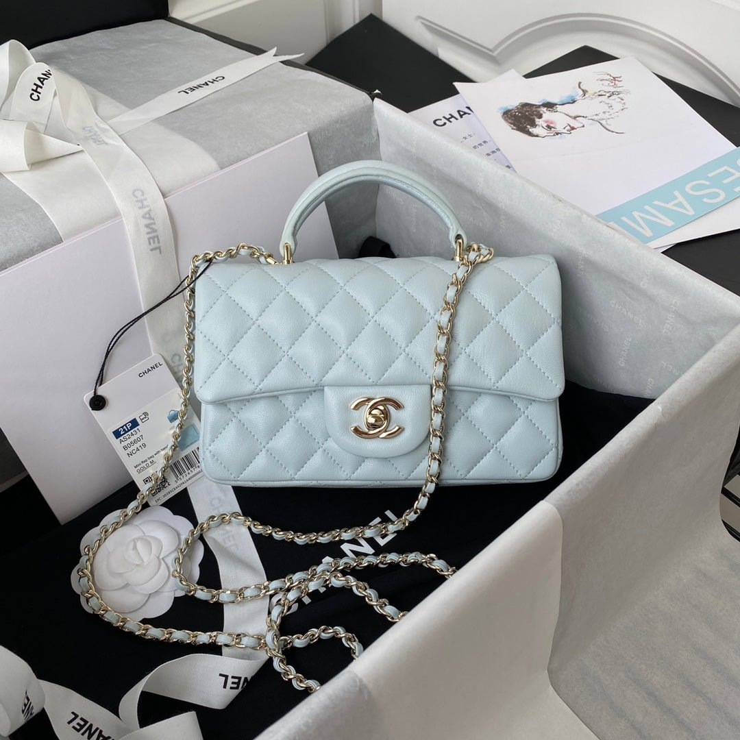 BOLSO PEQUEÑO CON SOLAPA Y ASA DE MANO CHANEL