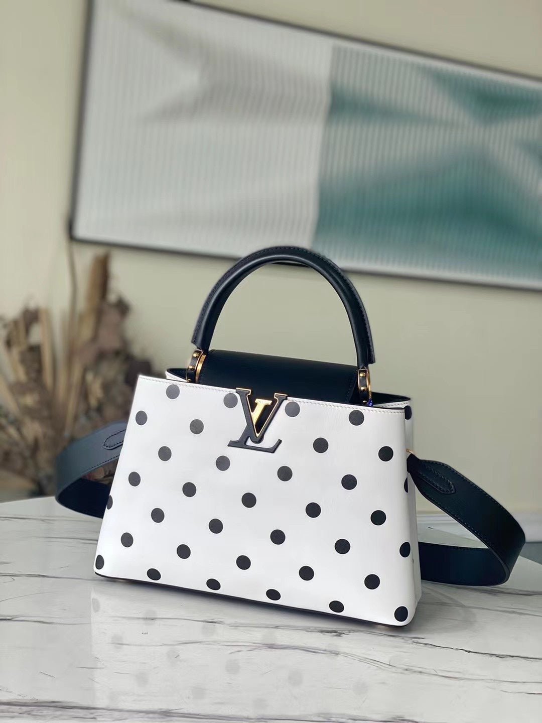 BOLSO CAPUCINES Louis Vuitton