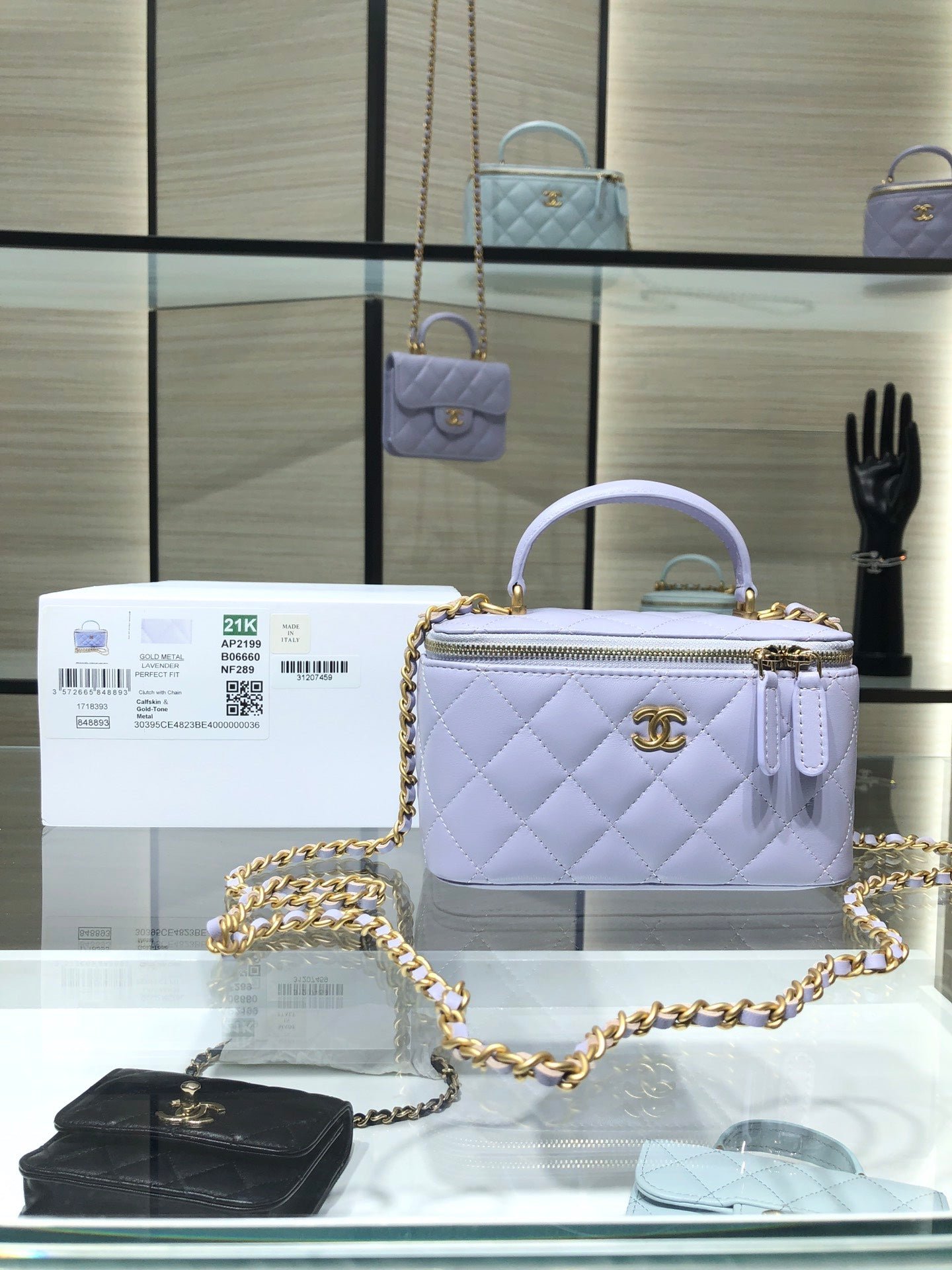 VANITY CASE CON CADENA CHANEL