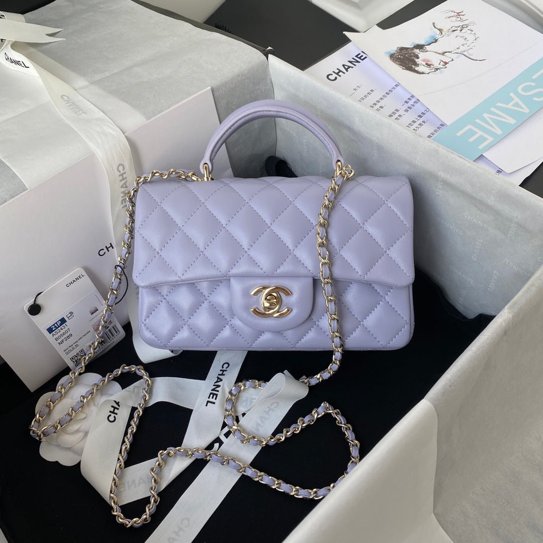 BOLSO PEQUEÑO CON SOLAPA Y ASA DE MANO CHANEL
