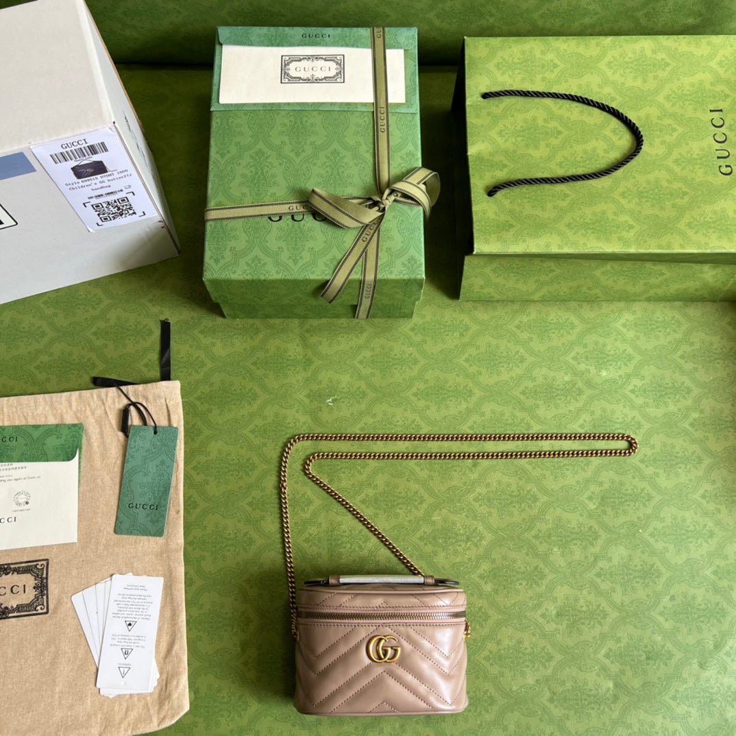 Minibolso de mano GG Marmont Gucci