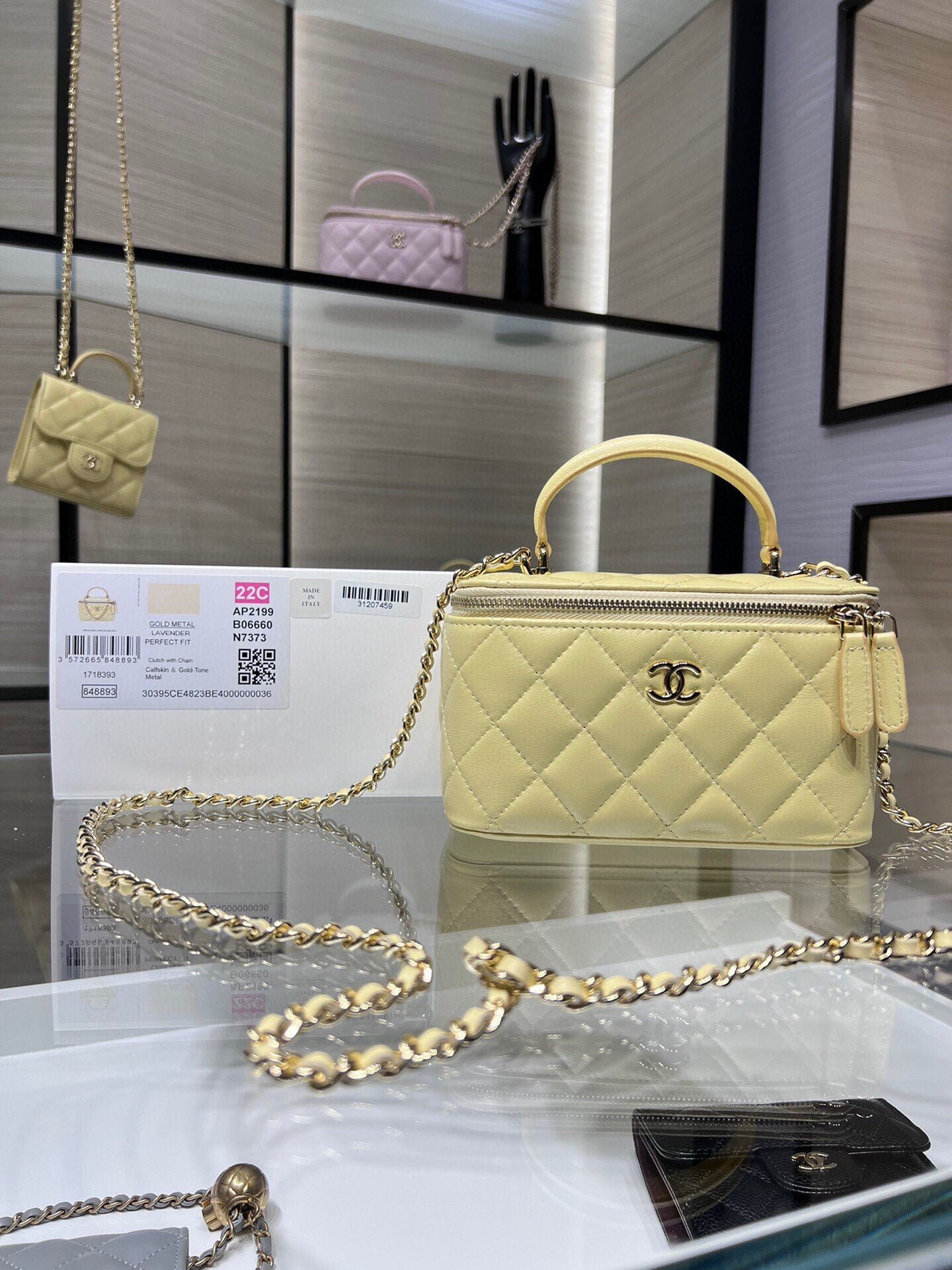 VANITY CASE CON CADENA CHANEL