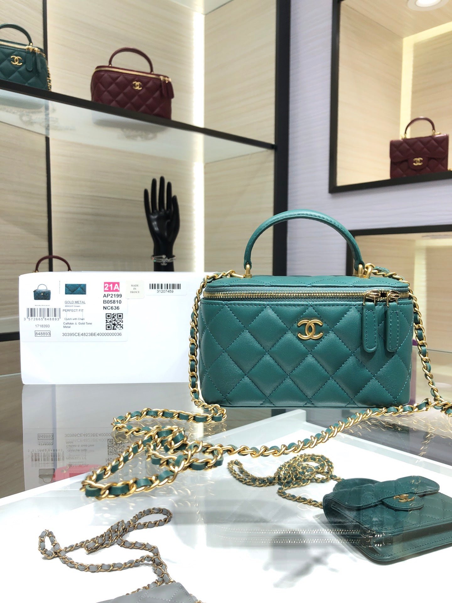 VANITY CASE CON CADENA CHANEL