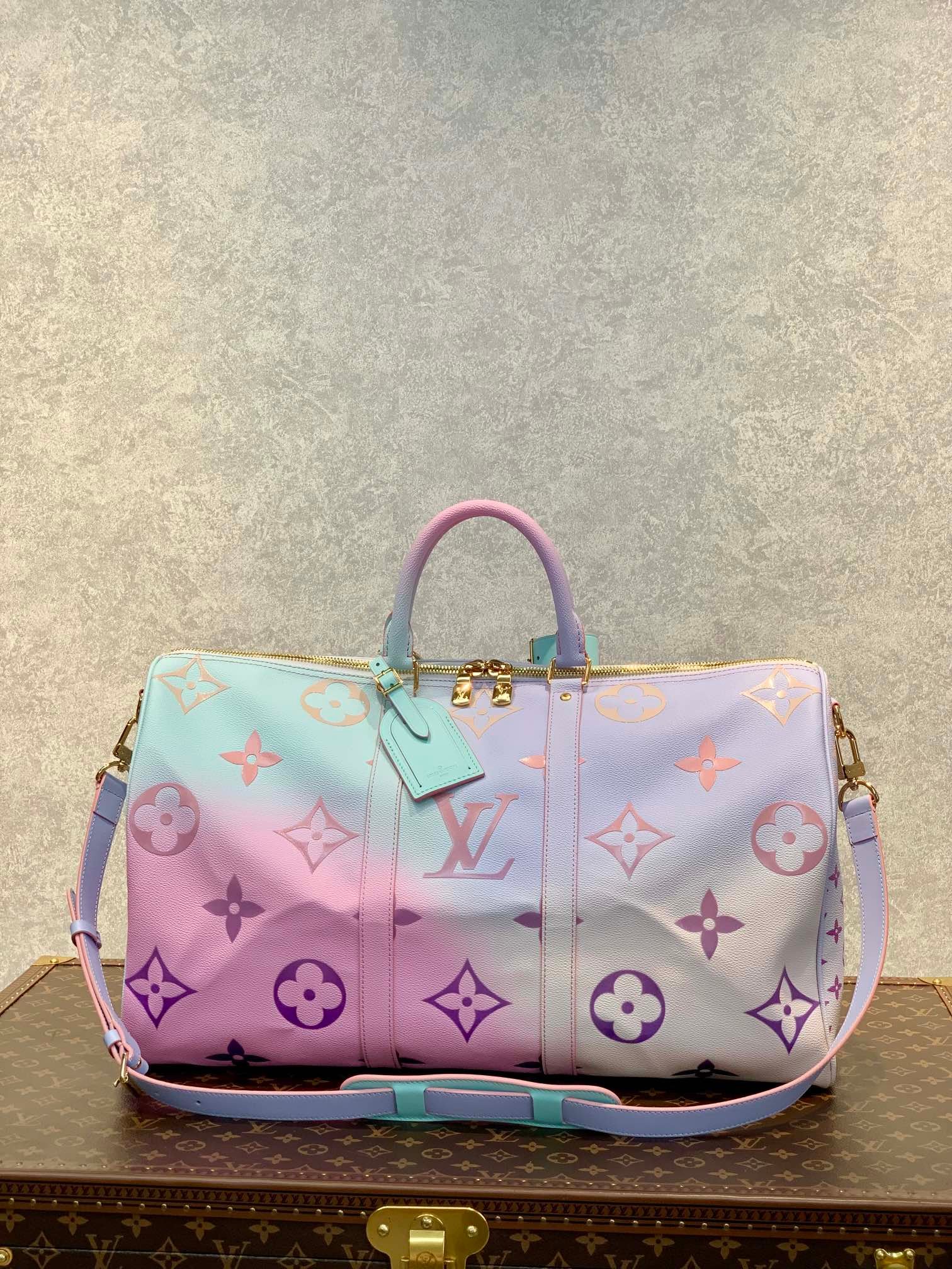 Keepall 45 con bandolera Louis Vuitton