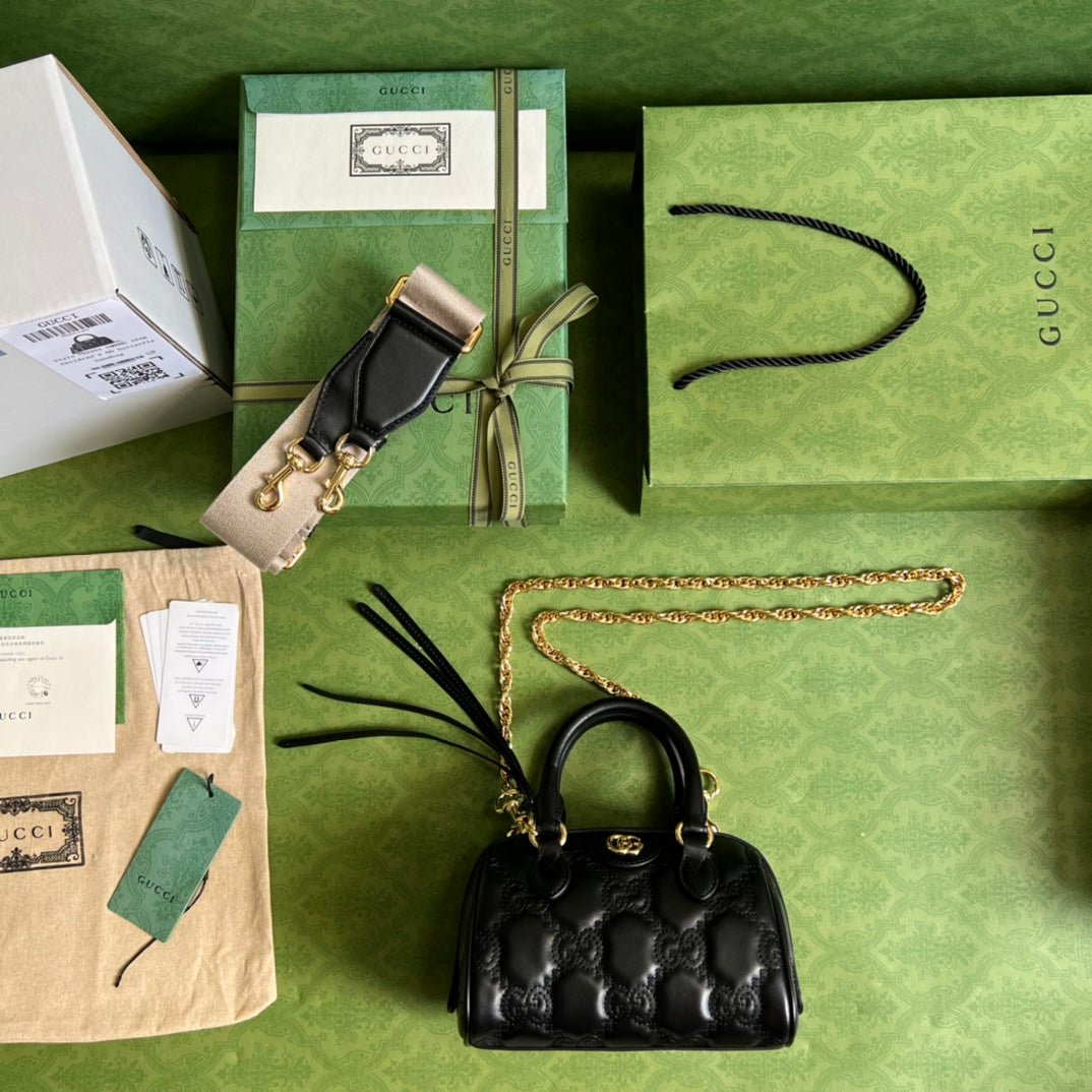 Bolso de mano en piel matelassé con GG Gucci