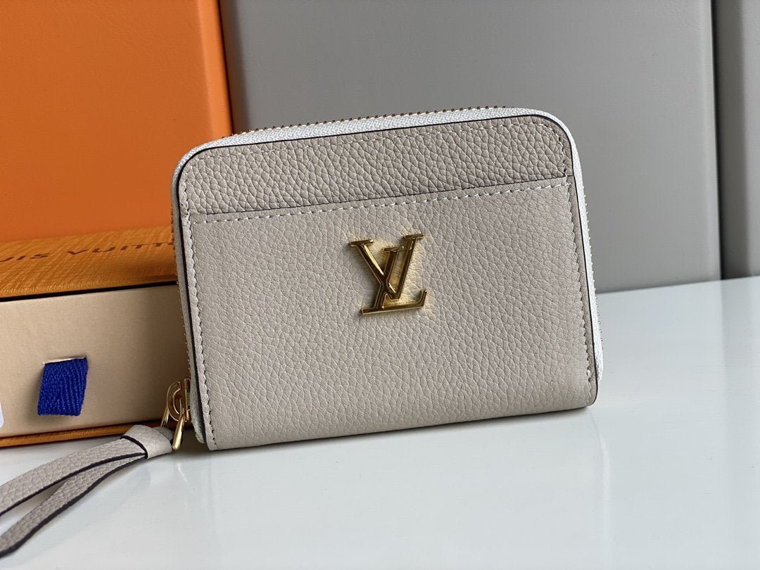 MONEDERO LOCKME ZIPPY LOUIS VUITTON