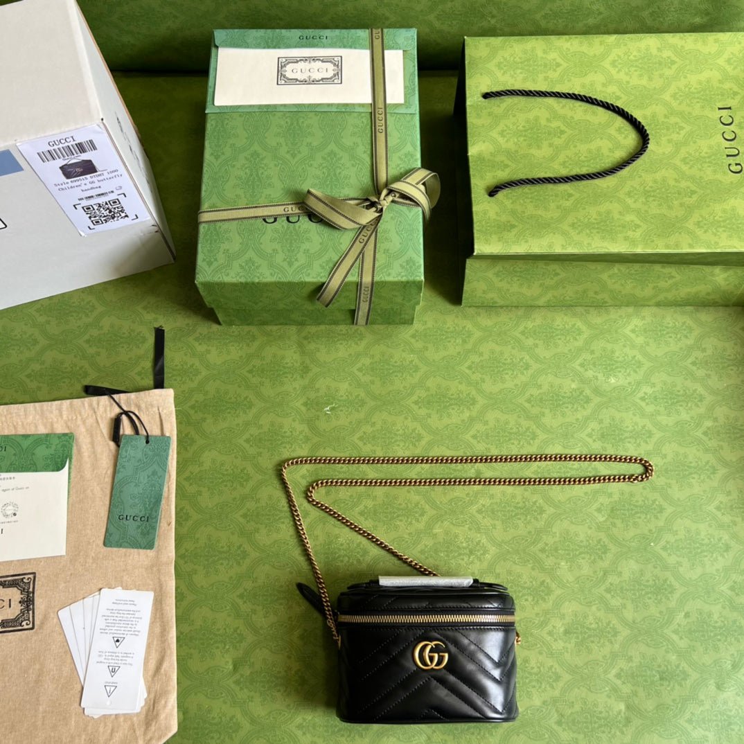 Minibolso de mano GG Marmont Gucci