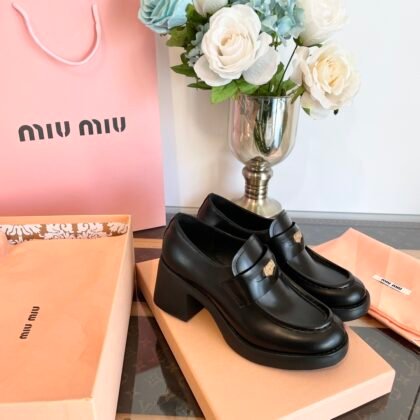 Mocasines de piel Miu Miu