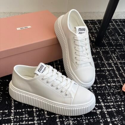 Zapatillas en piel Miu Miu