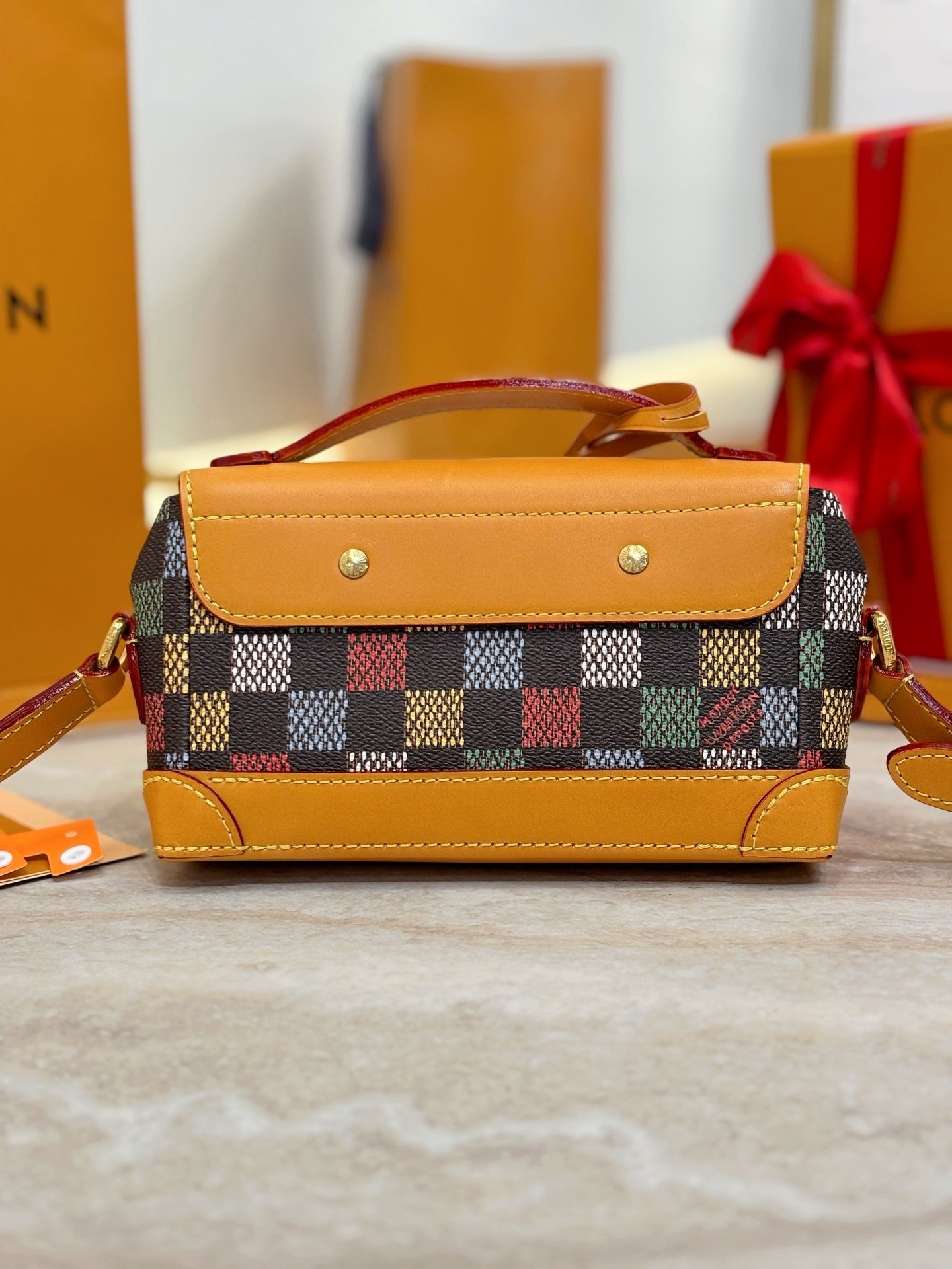 Cartera portátil Steamer East West Louis Vuitton - Imagen 3