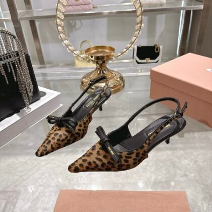 Zapatos de tacón destalonado en piel estampada Miu Miu